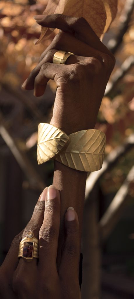 Model disciplined demonstration of  one-of-a-kind wearable art, crossing cultural boundaries.  