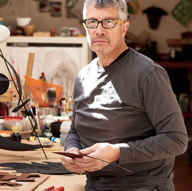 Ivan Barnett, creative consultant and coach, in his studio in Santa Fe, New Mexico, playing seriously.