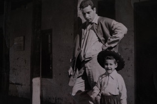 Picture of Ivan Barnett with his father Isa Barnett.  Kit Carson Road, Taos, New Mexico.
