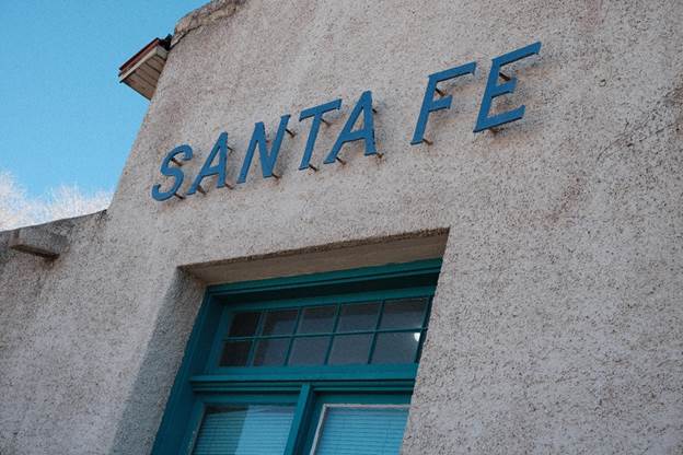 Exterior shot of the Santa Fe Depot at dusk.  From the collection of Ivan Barnett.